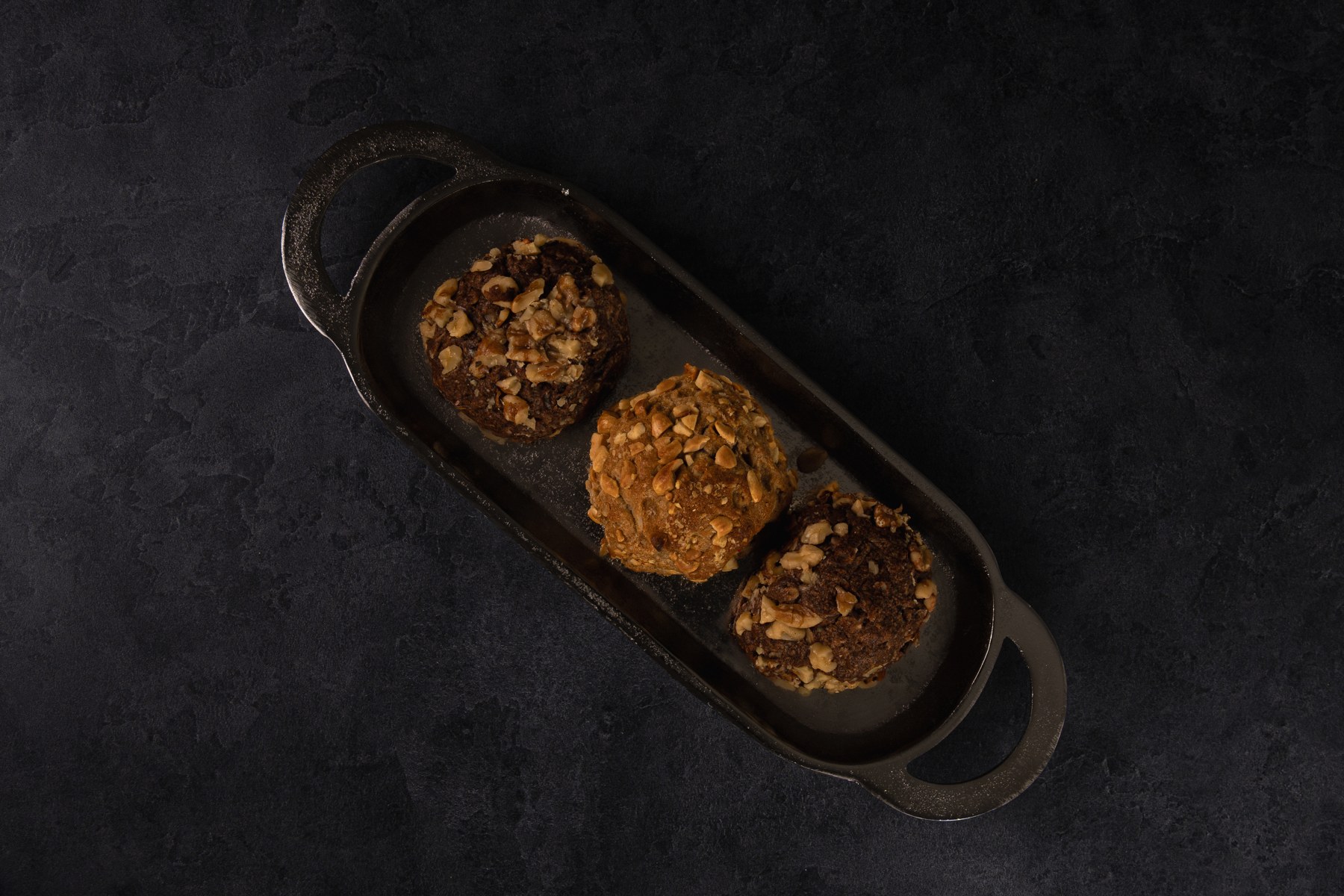 A collection of cookies arranged for product photography